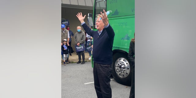 Virginia Democratic gubernatorial candidate Terry McAuliffe greets a handful of supporters outside the Virginia Democrats regional headquarters in Harrisonburg, Virginia