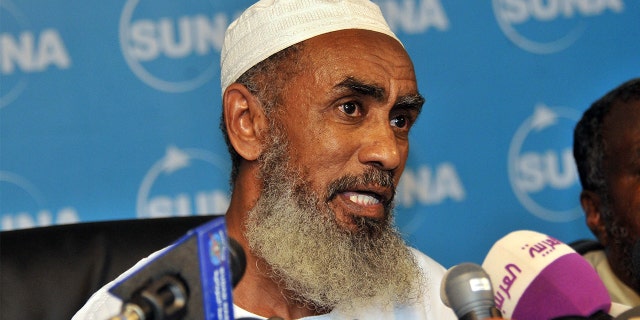 Sudanese Ibrahim al-Qosi, the former cook of slain Al-Qaeda founder Usama bin Laden, speaks during a press conference in Khartoum on July 11, 2012 after he was release from the US detention centre at Guantanamo Bay, Cuba and returned to his native Sudan when Court documents in August 2010 showed that his 14-year sentence would be suspended. Qosi had been held at the US-run Guantanamo prison since 2002 and was the first Guantanamo detainee to be tried by military tribunal under revised rules introduced by the administration of President Barack Obama. AFP PHOTO/EBRAHIM HAMID        (Photo credit should read EBRAHIM HAMID/AFP/GettyImages)