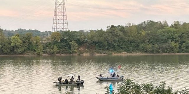 Authorities search the Ohio River for an SUV connected to a 2002 missing persons case in Ohio. 