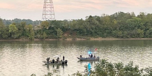 Authorities search the Ohio River for an SUV connected to a 2002 missing persons case in Ohio. 