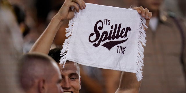 A member of the Texas A&amp;amp;M Corps of Cadets shows his support for Texas A&amp;amp;M running back Isaiah Spiller during the second half of an NCAA college football game against South Carolina, Saturday, Oct. 23, 2021, in College Station, Texas.