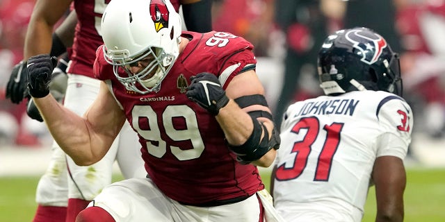 Arizona Cardinals defensive end J.J. Watt celebrates after a tackle against the Houston Texans during the first half of an NFL football game, Sunday, Oct. 24, 2021, in Glendale, Arizona.