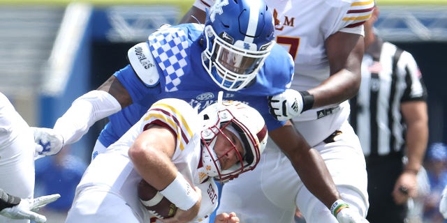 J.J. Weaver #13 of the Kentucky Wildcats sacks Rhett Rodriguez #4 of the ULM War Hawks at Kroger Field on Sept. 4, 2021 in Lexington, Kentucky.