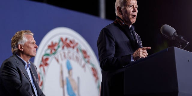 U.S. President Joe Biden campaigns for Democratic candidate for governor of Virginia Terry McAuliffe at a rally in Arlington, Virginia, U.S. October 26, 2021. REUTERS/Jonathan Ernst