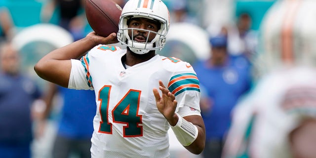 Miami Dolphins quarterback Jacoby Brissett (14) aims a pass during the first half of an NFL football game against the Indianapolis Colts, Sunday, Oct. 3, 2021, in Miami Gardens, Florida.