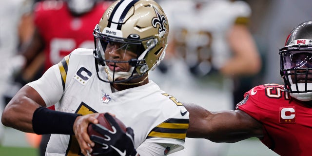 New Orleans Saints quarterback Jameis Winston (2) is brought down with a horse collar tackle by Tampa Bay Buccaneers inside linebacker Devin White (45) in the first half of an NFL football game in New Orleans, Sunday, Oct. 31, 2021.