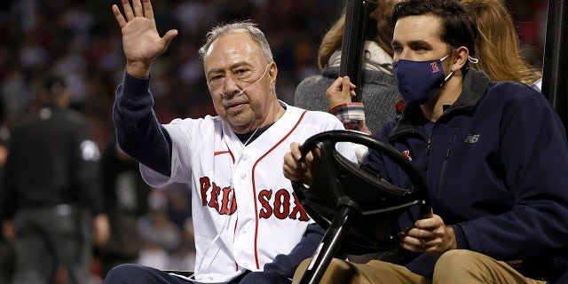 BOSTON, MASSACHUSETTS - OCTOBER 05: Jerry Remy, the Boston Red Sox broadcaster, waves to fans before throwing the ceremonial first pitch during the American League Wild Card game against the New York Yankees at Fenway Park on October 05, 2021 in Boston, Massachusetts.