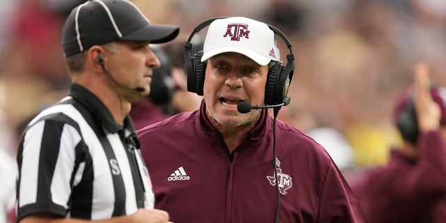 In this Saturday, Sept. 11, 2021 file photo, Texas A&M head coach Jimbo Fisher argues with a referee in the second half of an NCAA college football game against Colorado in Denver.  Texas A&M plays Arkansas on Saturday, September 25, 2021. 