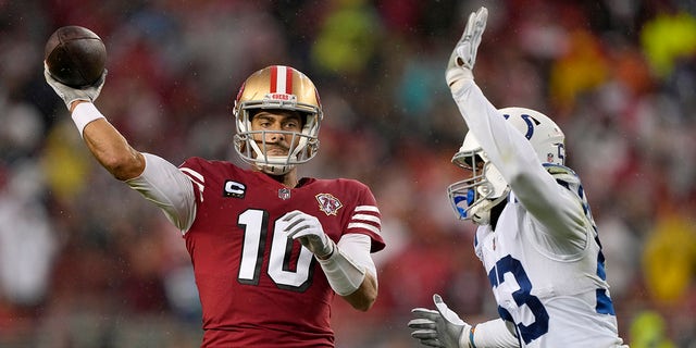 San Francisco 49ers quarterback Jimmy Garoppolo (10) passes against Indianapolis Colts outside linebacker Darius Leonard during the first half of an NFL football game in Santa Clara, Calif., Sunday, Oct. 24, 2021.