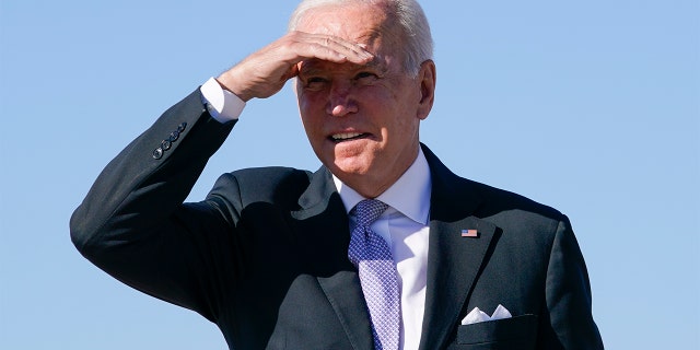 President Joe Biden shields his eyes from the sun as he walks toward Air Force One at Andrews Air Force Base, Maryland, on Oct. 20, 2021. A biopsy performed on a small lesion removed from the president's chest has been confirmed as basal cell carcinoma. Doctors say all cancerous tissue was removed and that no further treatment is required.