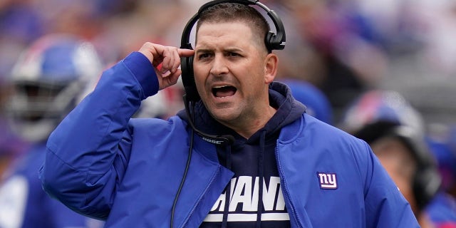 New York Giants head coach Joe Judge calls his players during the first half of an NFL football game against the Carolina Panthers in East Rutherford, New Jersey, on Sunday, October 24, 2021.