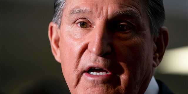 Sen. Joe Manchin, D-W.Va., makes a statement to reporters at the Capitol in Washington, Oct. 6, 2021. Manchin supports the 60-vote filibuster.