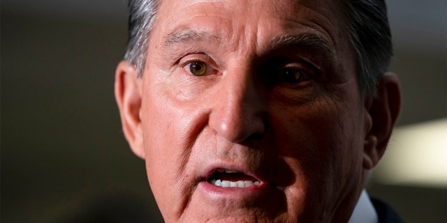 Sen. Joe Manchin, D-W.Va., makes a statement to reporters at the Capitol in Washington, Oct. 6, 2021. Manchin supports the 60-vote filibuster.