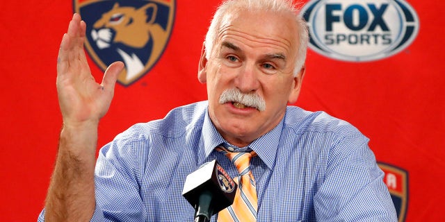 FILE - In this Jan. 21, 2020, file photo, Florida Panthers head coach and former Chicago Blackhawks coach, Joel Quenneville, responds to a question during his first visit back to Chicago as a head coach before an NHL hockey game between the Blackhawks and Panthers. The Blackhawks are holding a briefing Tuesday, Oct. 26, 2021, to discuss the findings of an investigation into allegations that an assistant coach sexually assaulted a player in 2010. The Blackhawks pledged to release the findings of the investigation, which general manager Stan Bowman, former coach Quenneville and others who were in the organization at the time agreed to cooperate with.