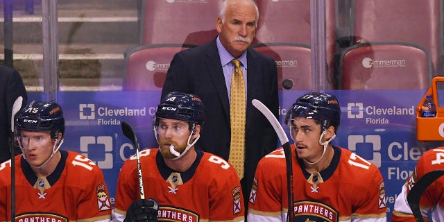 Florida Panthers head coach Joel Quenneville looks on from the bench during the first period of an NHL hockey game against the Colorado Avalanche, Tuesday, Oct. 21, 2021, in Sunrise, Fla.
