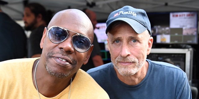 Jon Stewart, right, defended Dave Chappelle after many called for the comedian to be canceled following his remarks on the Netfliix stand-up special, ‘The Closer.’