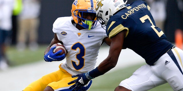 Georgia Tech defensive back Tariq Carpenter (2) hits Pittsburgh wide receiver Jordan Addison (3) during the first half of an NCAA college football game, Saturday, Oct. 2, 2021, in Atlanta.