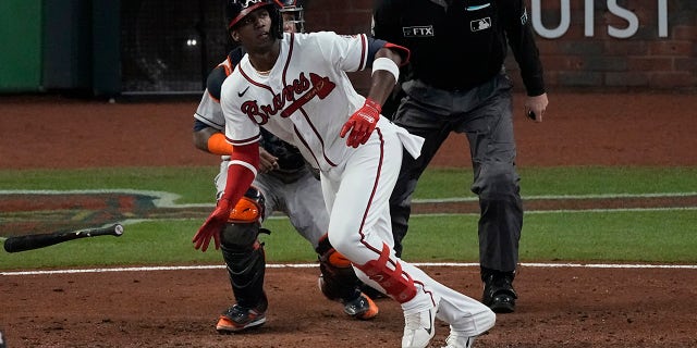 Atlanta Braves' Jorge Soler watches his home run during the seventh inning in Game 4 of baseball's World Series between the Houston Astros and the Atlanta Braves Saturday, Oct. 30, 2021, in Atlanta.