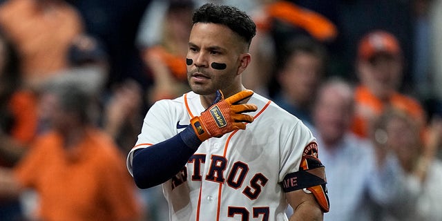 Houston Astros' Jose Altuve celebrates after a two-run home run against the Boston Red Sox during the sixth inning in Game 1 of baseball's American League Championship Series Friday, Oct. 15, 2021, in Houston.