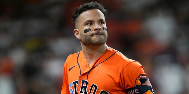 The Houston Astros' Jose Altuve reacts after flying out against the Boston Red Sox during the seventh inning in Game 2 of baseball's American League Championship Series Saturday, Oct. 16, 2021, in Houston.