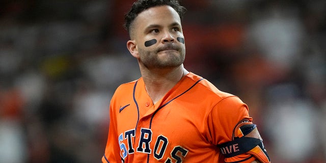 The Houston Astros' Jose Altuve reacts after flying out against the Boston Red Sox during the seventh inning in Game 2 of baseball's American League Championship Series Saturday, Oct. 16, 2021, in Houston.