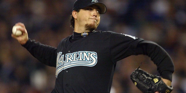 BRONX, NY - OCTOBER 25: Starting pitcher Josh Beckett #21 of the Florida Marlins throws a pitch against the New York Yankees in the first inning during game six of the Major League Baseball World Series on October 25, 2003 at Yankee Stadium in the Bronx, New York.