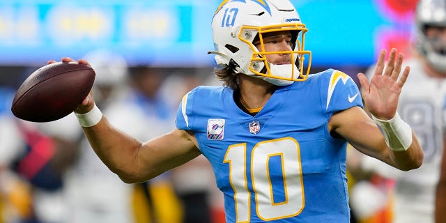 Los Angeles Chargers quarterback Justin Herbert throws a pass during the first half of an NFL football game against the Las Vegas Raiders Monday, Oct. 4, 2021, in Inglewood, Calif.