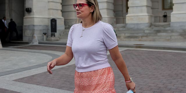 U.S. Senator Kyrsten Sinema (D-AZ) leaves the Capitol building following a vote in the Senate, in Washington, U.S., October 5, 2021. 