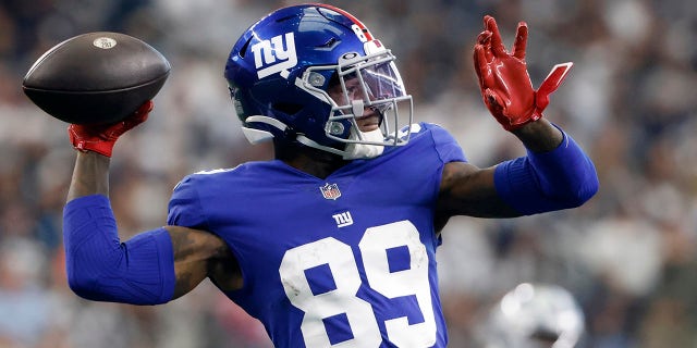 New York Giants wide receiver Kadarius Toney (89) throws a pass in the first half of an NFL football game against the Dallas Cowboys in Arlington, Texas, Sunday, Oct. 10, 2021.