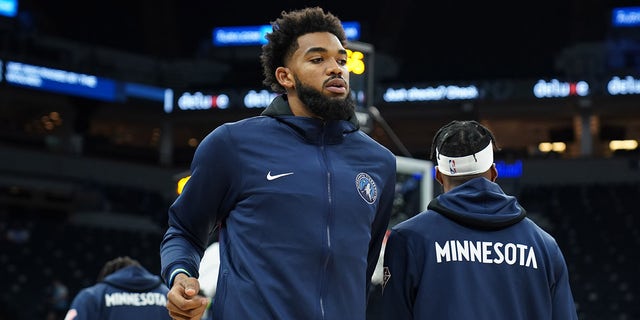 Karl-Anthony Towns of the Minnesota Timberwolves looks on before a preseason game against the New Orleans Pelicans Oct. 4, 2021 at Target Center in Minneapolis, Minn.