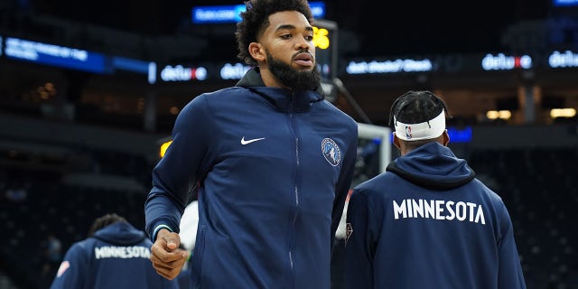 Karl-Anthony Towns of the Minnesota Timberwolves looks on before a preseason game against the New Orleans Pelicans Oct. 4, 2021 at Target Center in Minneapolis, Minn.