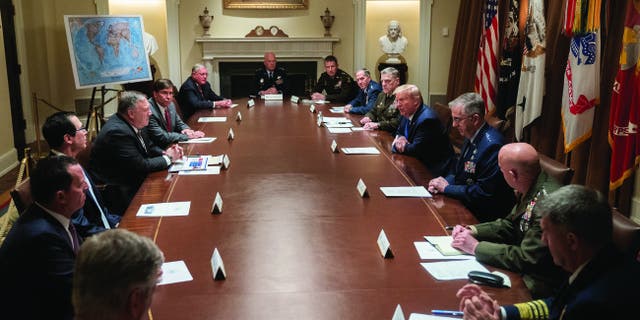 President Donald J. Trump, joined by Secretary of State Mike Pompeo, meets with senior military leadership and national security team members Saturday, May 8, 2020, in the Cabinet Room of the White House. (Official White House Photo by Joyce N. Boghosian)