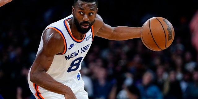 New York Knicks' Kemba Walker (8) drives toward the basket during the second half of an NBA basketball game against the Philadelphia 76ers Tuesday, Oct. 26, 2021, in New York. The Knicks won 112-99.