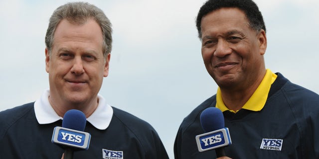 Commentators Michael Kay (left) and Ken Singleton during a pre-game show for the YES Network as the New York Yankees play against the Pittsburgh Pirates on March 3, 2010 at the George M. Steinbrenner Field in Tampa, Florida.