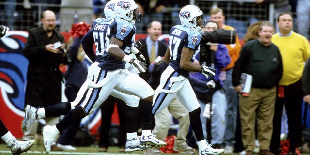 Tennessee Titans wide receiver Kevin Dyson (87) takes a kickoff return 75 yards for a touchdown during the AFC Wildcard Playoff, a 22-16 victory over the Buffalo Bills on January 8, 2000, at Adelphia Coliseum in Nashville, Tennessee.