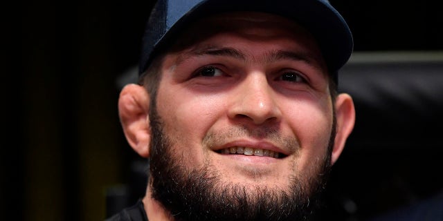 Khabib Nurmagomedov reacts after teammate Islam Makhachev's victory against Thiago Moises in their lightweight bout during the UFC Fight Night event at UFC APEX on July 17, 2021, a Las Vegas, Nevada.