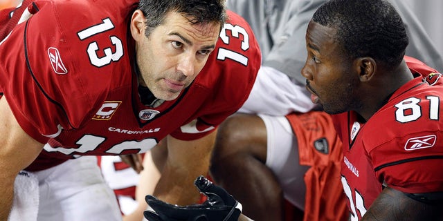 Arizona Cardinals quarterback Kurt Warner (left) talks to his fourth quarter wide receiver Anquan Boldin against the Indianapolis Colts during an NFL game in Glendale, Ariz. On September 27, 2009. The Colts defeated the Cardinals.