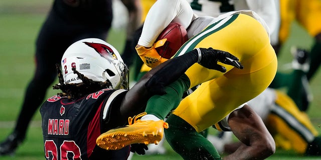Arizona Cardinals running back Jonathan Ward (29) collides with Green Bay Packers running back Kylin Hill during the second half of an NFL football game, Thursday, Oct. 28, 2021, in Glendale, Ariz. Both players left the game after the hit.