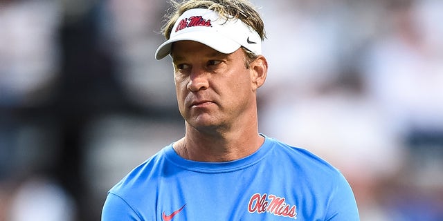 Oct 16, 2021; Knoxville, Tennessee, USA; Mississippi Rebels head coach Lane Kiffin on the field before the game against the Tennessee Volunteers at Neyland Stadium.