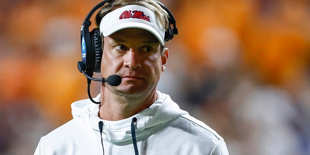 Mississippi coach Lane Kiffin walks the sideline during the second half of the team's NCAA college football game against Tennessee on Saturday, Oct. 16, 2021, in Knoxville, Tenn.