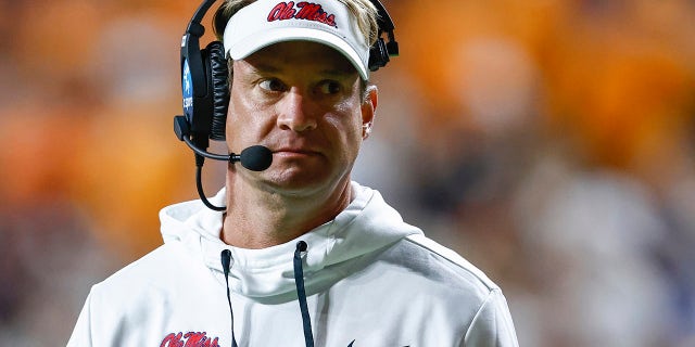 Mississippi coach Lane Kiffin walks to the sidelines during the second half of the team's NCAA football game against Tennessee on Saturday, October 16, 2021, in Knoxville, Tenn.