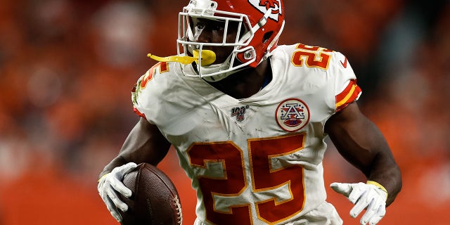 Kansas City Chiefs running back LeSean McCoy runs the ball in the first quarter against the Denver Broncos at Empower Field at Mile High.