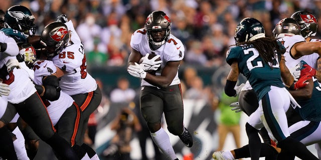 Tampa Bay Buccaneers running back Leonard Fournette (7) runs with the ball during the second half of an NFL football game against the Philadelphia Eagles on Thursday, Oct. 14, 2021, in Philadelphia.