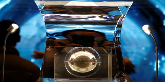 Moon samples from China’s lunar exploration program Chang'e-5 Mission are displayed during an exhibition at the National Museum in Beijing, China March 3, 2021.