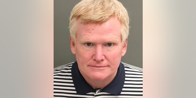 Alex Murdaugh appeared in a new mugshot following his arrest in Orlando, Florida on charges in connection to housekeeper Gloria Satterfield insurance settlements.