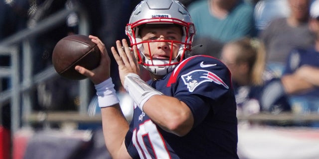 New England Patriots quarterback Mac Jones throws a pass during the first half of an NFL football game against the New Orleans Saints, Sunday, Sept. 26, 2021, in Foxborough, Mass.