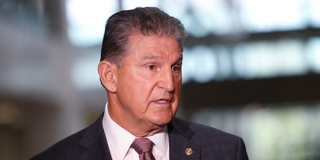 Sen. Joe Manchin, D-W.Va., speaks to reporters outside of his office on Capitol Hill on October 6, 2021, in Washington, D.C. (Photo by Kevin Dietsch/Getty Images)