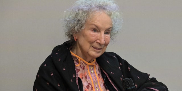 Margaret Atwood interviewed at a press conference,