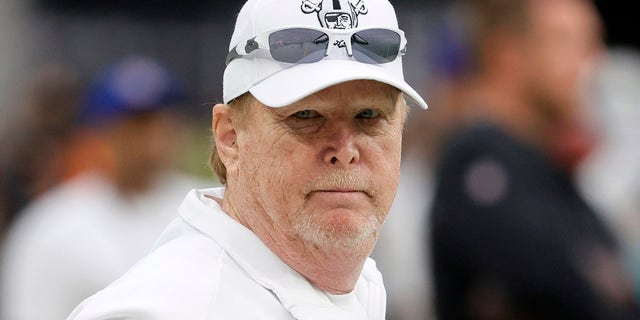 Las Vegas Raiders owner and managing general partner Mark Davis watches his team warm up before a game against the Miami Dolphins at Allegiant Stadium on September 26, 2021 in Las Vegas, Nevada. The Raiders defeated the Dolphins 31-28 in overtime. 