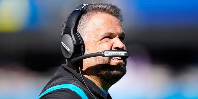 Carolina Panthers head coach Matt Rhule watches play against the Minnesota Vikings during the first half of an NFL football game, Sunday, Oct. 17, 2021, in Charlotte, N.C.